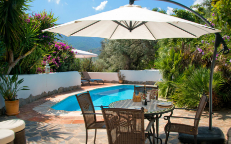 Seating area by swimming pool