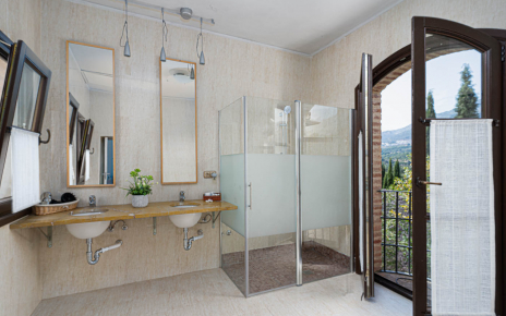 En suite bathroom with superb views