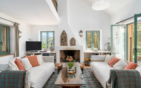 Doors opening to terraces from living area