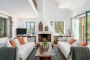 Doors opening to terraces from living area