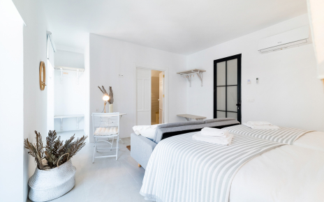 Suite 2 with walk-in dresser and two balconies