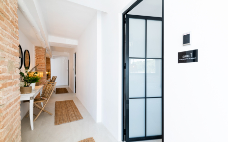 Hallway on upper floor leading to some bedrooms