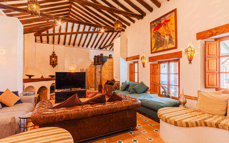 Main living area with large TV