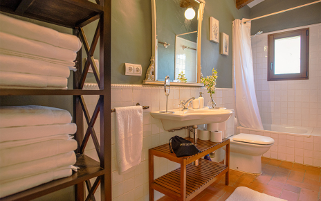 Bathroom with half bathtub