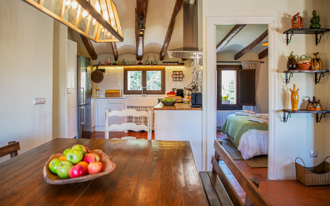 Dining area with well equipped kitchen