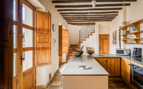 Great kitchen with doors to barbecue patio