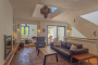 Living are with doors to patio and pool 