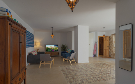 The only TV is on the living space of the mid-level