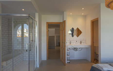 Bathtub and walk-in shower in master bedroom