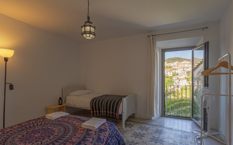 Bedroom 5 (mid level) with two beds