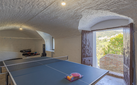 Door to stairs down to pool area and bedroom 8