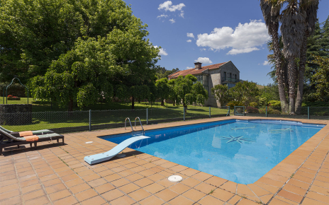 The owner house is on the other side of the pool