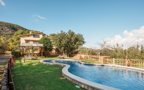 Large fenced pool with lawned area