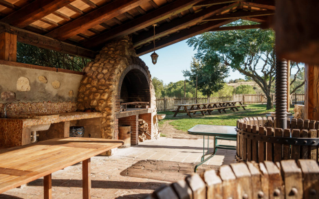 Old wine press features in barbecue area