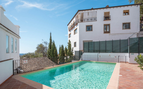 Pool area and other apartments on an upper level