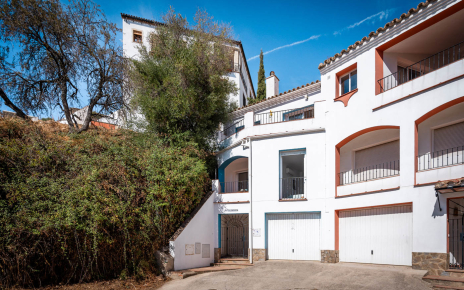 Your apartment is on the left (3 levels), painted in blue