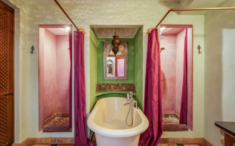 Ground floor bathroom with walk-in showers and bathtub