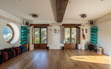 The large living area can be used for yoga if required